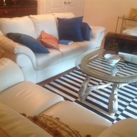 Beautiful white leather sofa, loveseat, chair and ottoman