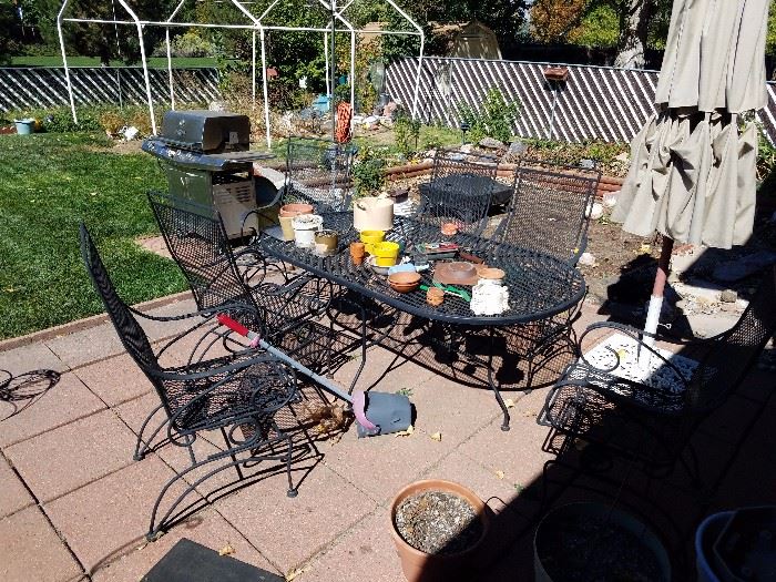 Rod Iron Patio furniture, lawn mowers, weed wackers, bbq, smoke pit, tools, and much more in shed.