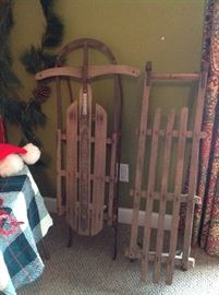 Two old sleds, a Royal Racer and an Eifel