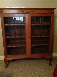 Oak leaded glass door bookcase, marked Liverpool