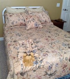Full sz iron headboard. Full spread, dust ruffle/ shams/ throw pillow and 2 sets of curtains