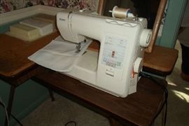 nice Kenmore sewing machine, lots of craft items and some fabric