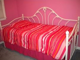 White wrought iron daybed, twin mattress & separate trundle