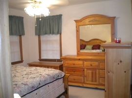 Broyhill bedroom set..King bed, night stand, dresser, mirror, chest of drawers and chest with two drawers. King mattress and box springs...has been vacuumed weekly.
