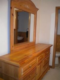 Broyhill bedroom set..King bed, night stand, dresser, mirror, chest of drawers and chest with two drawers. King mattress and box springs...has been vacuumed weekly.