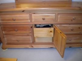 Broyhill bedroom set..King bed, night stand, dresser, mirror, chest of drawers and chest with two drawers. King mattress and box springs...has been vacuumed weekly.