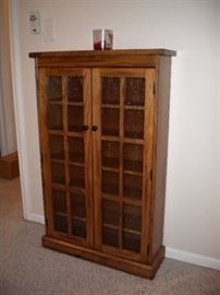 Glass covered cabinet... for your books, cds, dvds, & more
