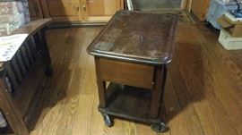 Old Doctors office table on wheels with drawer.  Must See