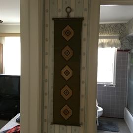 Needlepoint wall hanging.