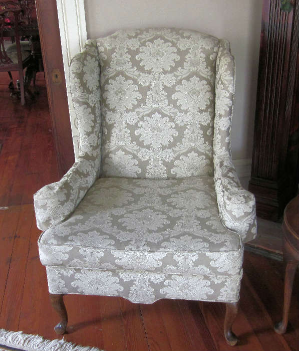 One of two matching Queen Anne wing chairs.