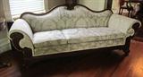 Beautiful Federal sofa; Carved cornucopia on the front of both arms; Carved eagle in top, center of the sofa back. Approximately 7 feet long.