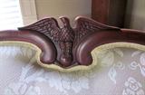 Detailed photo of carved eagle in center of the Federal sofa back.