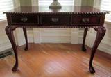 Beautiful Chippendale three-drawer writing table; 45" wide.