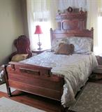 Awesome walnut Eastlake bed; Head of bed is approximately 6.5 feet tall. See close-up photo.