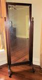 Wonderful heavily carved cheval mirror; 6.5 feet tall, 31.5" wide.