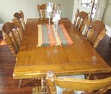 Vintage Early American style dining table and chairs.
