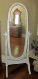 Vintage, oval cheval mirror; mirror has been painted.