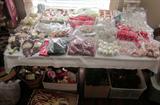 Large assortment of Christmas decorations, ornaments, ribbon, wrapping paper, etc.
