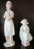 Lladro nurse figurines.