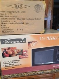 Kenmore microwave, new unopened box and new in box pressure cooker