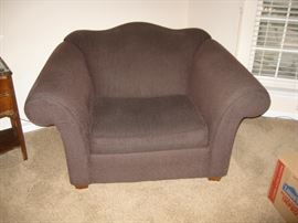 This very nice chair is larger than an average side chair and a bit smaller than a loveseat.