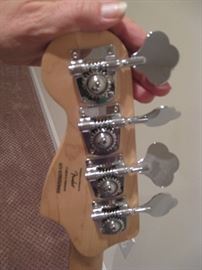 Back of Fender guitar/metal tuning pieces