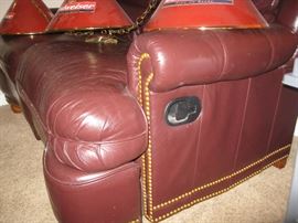 Leather loveseat recliner button