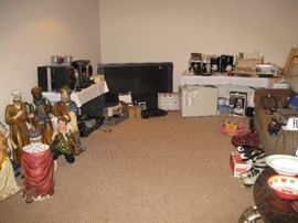 Large TV, speakers, kitchen tabletop appliances, Christmas nativity set