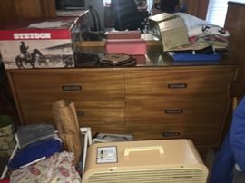 Midcentury dressers and Stetson hat