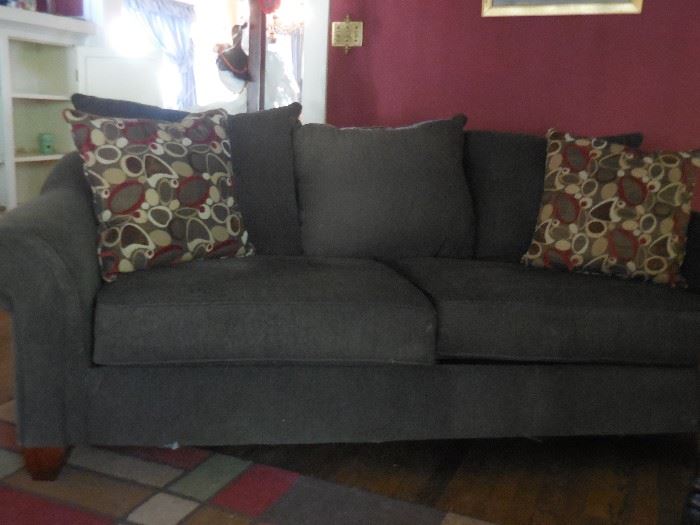Ashley Furniture Charcoal Gray Sofa with Pillows,