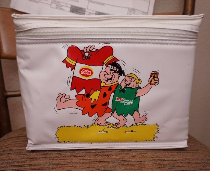 Fred Flintstone and Barney Rubble on a soft sided cooler for Carta Blanca
