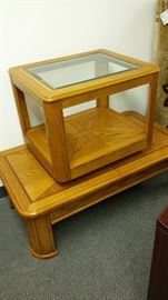 LOVELY OAK MATCHING COFFEE TABLE WITHHIDDEN STORAGE UNDERNEATH AND END TABLE WITH BEVELED GLASS TOP!  