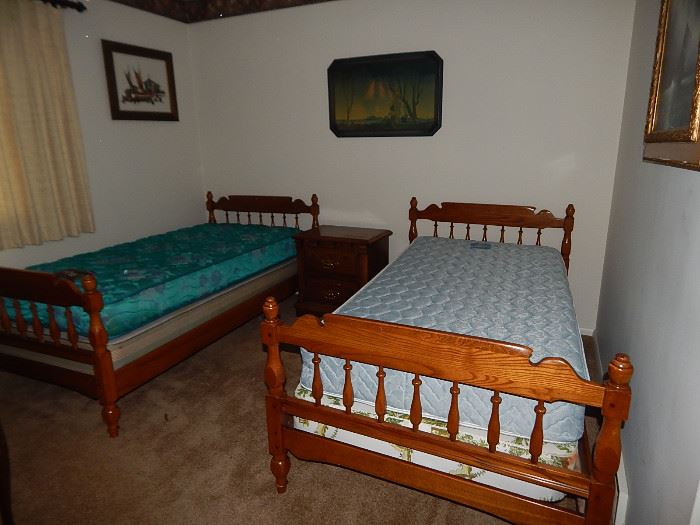 Pr of matching twin beds, which may be used as bunk beds.  They match the chest of drawers