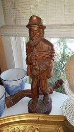 Carved Man smoking a Pipe