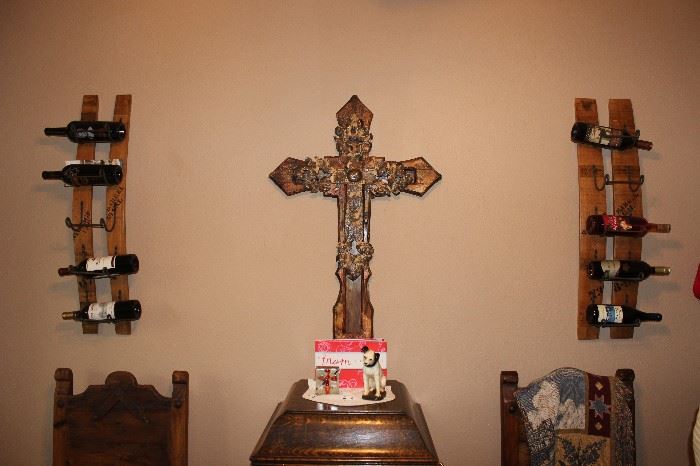 large cross, wine shelf