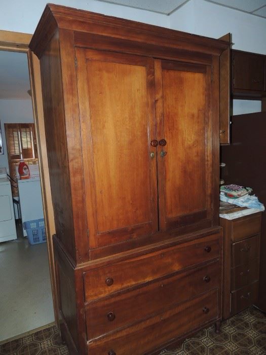 Antique country cupboard with four shelves and three drawers