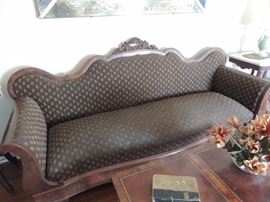 antique walnut sofa on casters