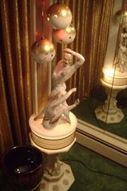 1950's floor lamp---ball light light up with multi-colored lights shiny out of small holes---table is a white lucite and lights up too