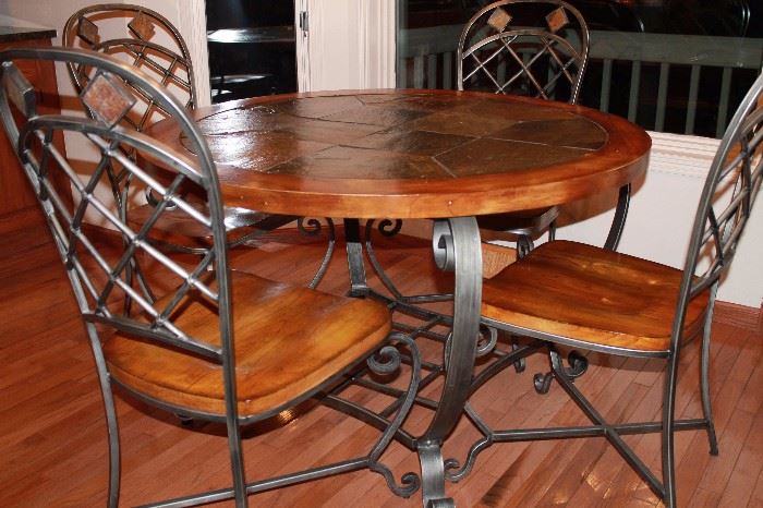 Originally purchased at Benson Stone. Tile top dining set.