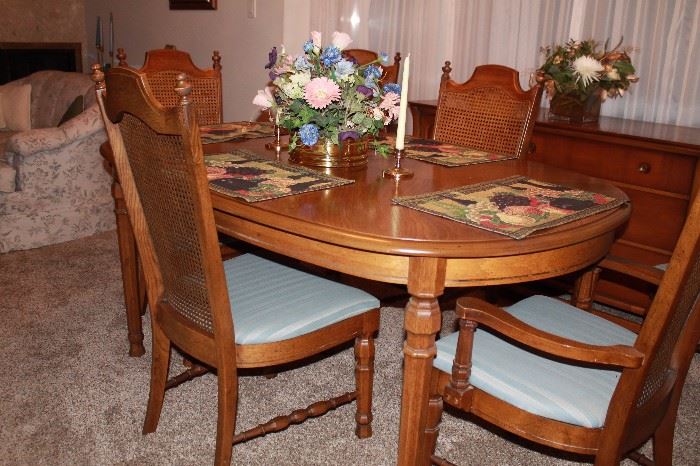 Caned back chairs and lovely dining table. 