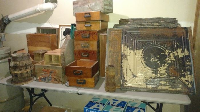 Old wooden drawers and boxes and old ceiling tiles