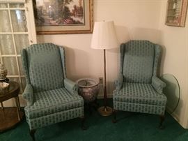 Two matching wing back chairs