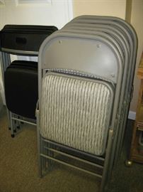6 padded folding chairs and 4 black folding chairs