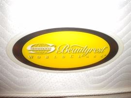 Simmons Beautyrest World Class King mattress and box spring. Barely used in excellent condition!