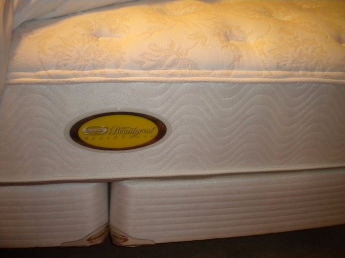Simmons Beautyrest World Class King mattress and box spring. Barely used in excellent condition!