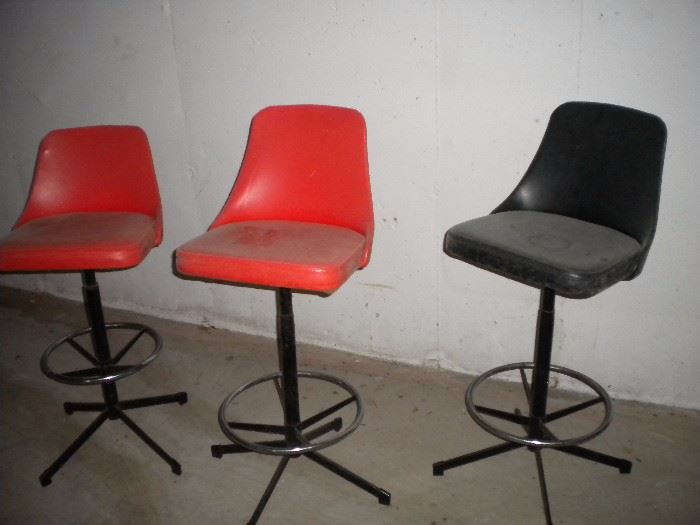 Vintage bar stools two orange/one black