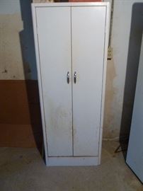 white metal storage cabinet with doors