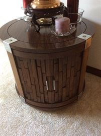 One of two modern barrel end table