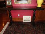 Antique library table with carved detail legs