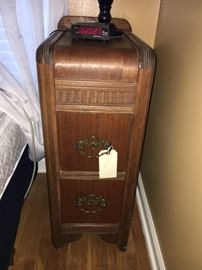Antique waterfall style night stand.